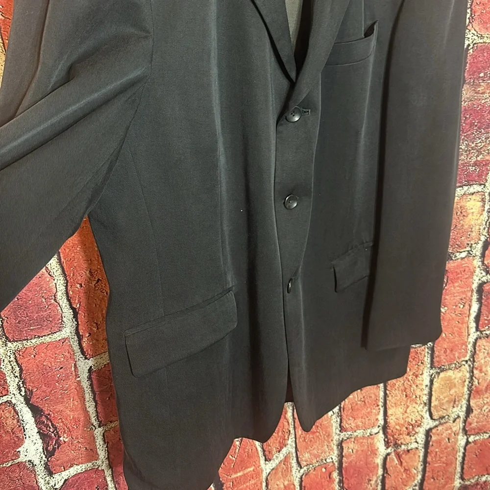 Oscar de la Renta used excellent